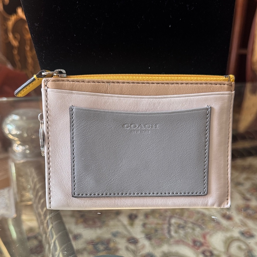 Card Holder in Gray and Cream leather coach